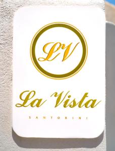 a sign for la vista signature restaurant at La Vista Santorini in Fira