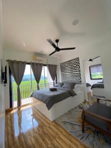 Letto o letti in una camera di LamanLeman Langkawi