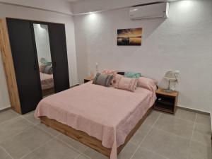 Ένα ή περισσότερα κρεβάτια σε δωμάτιο στο Το Στενάκι