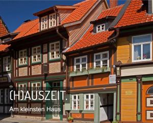 an illustration of a house with orange roofs at Ferienwohnung direkt Am kleinsten Haus in Wernigerode in Wernigerode