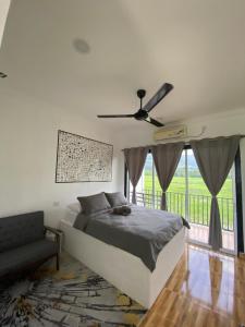 Letto o letti in una camera di LamanLeman Langkawi
