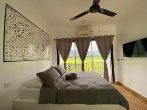 Letto o letti in una camera di LamanLeman Langkawi