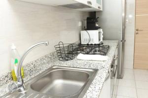 Η κουζίνα ή μικρή κουζίνα στο Appartement F3 Cité de l’Émergence Dakar Plateau +57 φωτογραφίες