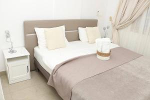 Ένα ή περισσότερα κρεβάτια σε δωμάτιο στο Appartement F3 Cité de l’Émergence Dakar Plateau