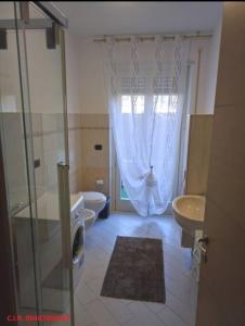 Koupelna v ubytování Domus Parca Apartment, Host: Shamira