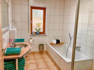 Koupelna v ubytování Ferienwohnung Gerne-Da + 26 fotografií