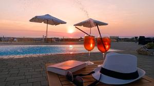 The swimming pool at or close to Il giardino dei tramonti