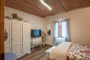 A bed or beds in a room at Affittacamere Il Bastione 27