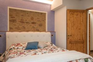 A bed or beds in a room at Affittacamere Il Bastione 27