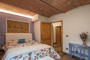 A bed or beds in a room at Affittacamere Il Bastione 27