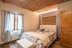 A bed or beds in a room at Affittacamere Il Bastione 27
