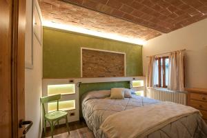 A bed or beds in a room at Affittacamere Il Bastione 27