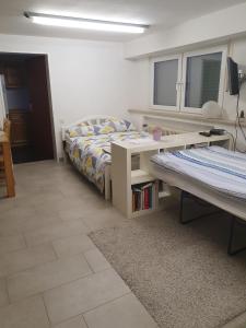 Ένα ή περισσότερα κρεβάτια σε δωμάτιο στο Valley Road House 1 Bedroom Apt