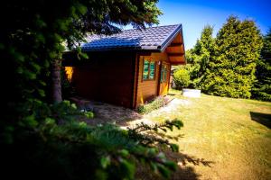 Zahrada ubytování Domek Między Wodą + 7 fotografií