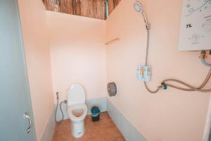 Ванная комната в ใจโฮมสเตย์