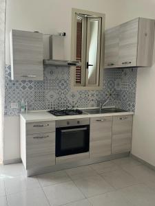 Dapur atau dapur kecil di Dimora Siciliana Apartment