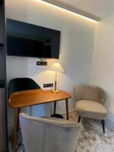 Posezení v ubytování Hôtel Lancelot & Spa - Domaine du Roi Arthur