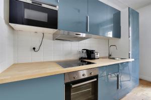 Een keuken of kitchenette bij Pick A Flat's Apartment in Batignolles - Rue Truffaut