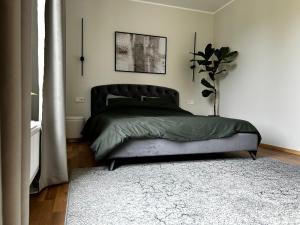 Voodi või voodid majutusasutuse Vilja Apartment with terrace and sauna toas