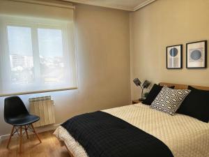 En eller flere senge i et værelse på Amplio, cómodo y estiloso apartamento