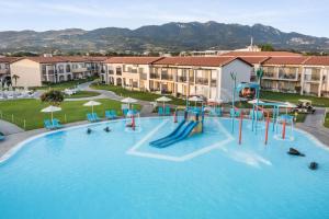 a large swimming pool with a water park at Labranda Marine Aquapark in Tigaki