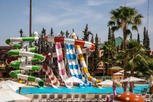 a water slide in a swimming pool at Labranda Rose Aqua Parc in Marrakech