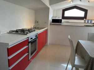 A kitchen or kitchenette at Trilocale in centro storico a Spoleto