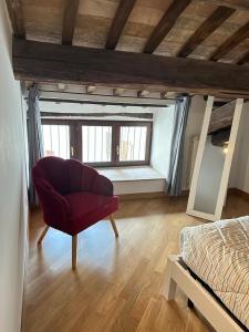 A bed or beds in a room at Trilocale in centro storico a Spoleto
