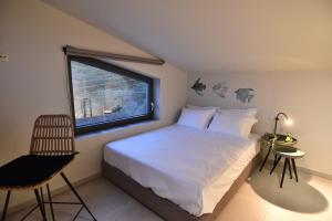 Llit o llits en una habitació de Welcome Inn