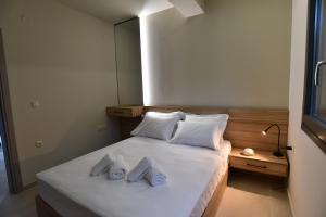 Llit o llits en una habitació de Welcome Inn