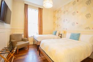 Postel nebo postele na pokoji v ubytování Parc Suites Hotel + 37 fotografií