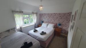 Billede fra billedgalleriet på 6 Bedroom Huge Holiday Home with parking i Luton