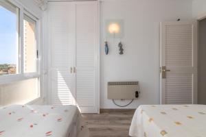 Letto o letti in una camera di La Escala