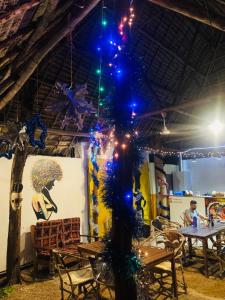 Reštaurácia alebo iné gastronomické zariadenie v ubytovaní Wakanda Nungwi