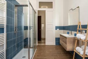 a bathroom with a shower and a sink at Le Case di Franca in Trapani +44 photos