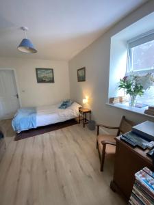 Postel nebo postele na pokoji v ubytování Geraldine House