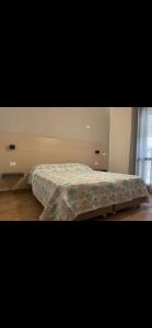 En eller flere senge i et værelse på Casa vacanza la tonnara