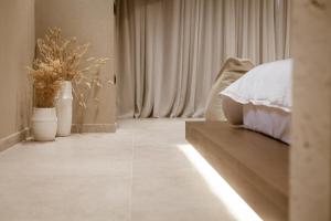 Voodi või voodid majutusasutuse Sevasti Seaview Suite toas