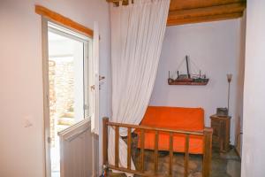 Кровать или кровати в номере Dream summer house in Tinos