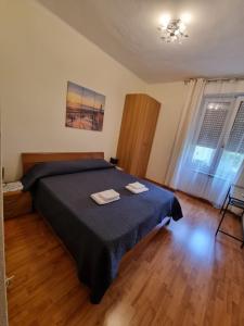 Postel nebo postele na pokoji v ubytování Alloggio Silva