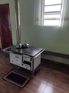 Casas de temporada Serra dos Bitus tesisinde mutfak veya mini mutfak