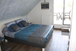 Postel nebo postele na pokoji v ubytování MOR-HA-MARCH Chambres d'Hôtes