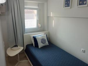 Posteľ alebo postele v izbe v ubytovaní Amazing Maisonettes in Skiathos
