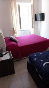 A bed or beds in a room at il Biscottino
