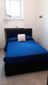 A bed or beds in a room at il Biscottino