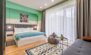 Postel nebo postele na pokoji v ubytování Devdaraki Apartments