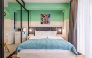 Postel nebo postele na pokoji v ubytování Devdaraki Apartments