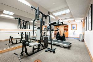 a gym with treadmills and machines in a room at Sleeps 2 - Free Parking - DTC Boston Commons in Greenwood Village