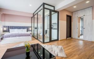 Postel nebo postele na pokoji v ubytování Devdaraki Apartments
