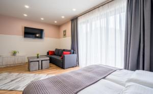 Postel nebo postele na pokoji v ubytování Devdaraki Apartments